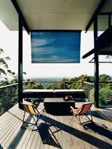 A large deck off the living room overlooks the hills of Noosa and the Pacific Ocean.