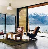 The main living area. The home is flanked on the east by a precipitous mountain range named The Remarkables. In summer, the weather gets hot enough for the family to go swimming and boating.