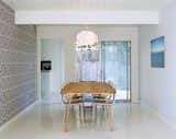 Dining Room, Pendant Lighting, Table, and Chair On those rare sunny days the Segerholts might even forsake their Doble dining table by Montis for their green backyard.  Photo 5 of 15 in A Midcentury Modern Home in Southwest Portland