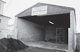 An outbuilding that belonged to the warehouse complex; today the same space holds the courtyard.  Photo 4 of 17 in Inside Job