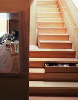 Tan built storage into every available corner of the house, including the stairs, each of which contains a drawer.