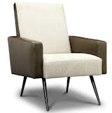 The Philippe armchair by Jonathan Adler.  Search “traffic armchair” from Kyle Schuneman on Masculine Design