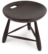 This was one of my favorite pieces in the collection—eye-catching for its simplicity and the pleasing shape of the seat. The stool, made from Brazilian Eucalyptus, is inspired by the traditional milkmaid's stool used throughout Brazil, with three legs and a single-lathed hollow seat. The handle is a functional detail but it also makes for a beautiful visual embellishment. 15 ¾” h x 17 ¾” diam.  $550.00  Photo 2 of 8 in Brazilian Design at the MoMA Store