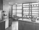 Interior of prefab house showing kitchen looking out into dining room, designed by Frank Lloyd Wright.  Photo 3 of 7 in An Introduction to Kitchen Design