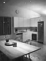 Calder Smith's kitchen before renovations. He says the space "had no redeeming qualities."  Photo 2 of 2 in Open Kitchen