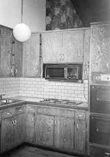 The kitchen that De Matran started with was cramped and completely outdated.  Photo 2 of 2 in Model Worthy