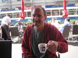 Architect Felix Oesch enjoying an espresso at the Cafe Odeon across the street from Lake Zurich.