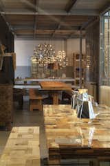 Showroom featuring Waste Table in high-gloss lacquered scrapwood