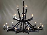 Chandelier in black plywood  Search “big bang chandelier” from Piet Hein Eek