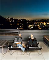 Joe Day and Nina Hachigian relax on their terrace overlooking the hills in Silver Lake area of Los Angeles.