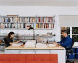 Office, Desk, Chair, Storage, and Shelves The family that works together stays together: Hachigian and Day at his-and-hers workstations in the shared lower-level study.  Photos from Way Out West