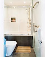 Their bathroom has walls of watertight Plexiglas. “They were so easy to set up,” John says, “the contractors installed all six bathrooms in one day.”