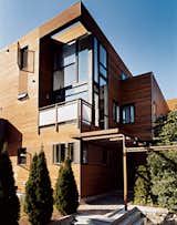 Exterior, House Building Type, Wood Siding Material, and Flat RoofLine The building’s south elevation. The lofty double-height balcony, with windows leading into his study, shows how the architects’ break from the triple-decker’s usual horizontality created dramatic results.  Search “60s rock superstar micky dolenz creates handmade furniture his daughters help” from Beantown Dream