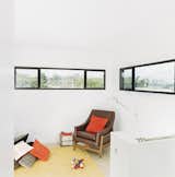 Windows on the third floor frame views of the Mississippi River.