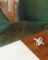 A ceramic Bouroullec vase sits atop a coffee table by Joseph-André Motte.  Photo 13 of 14 in Like a Kid in a Candy Store