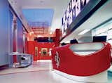 Like the aesthetics of Bolidism, a movement Iosa Ghini founded in 1985, fluid curves characterize many of his designs. Seen here is the interior of the Ferrari store in Rome, which he designed in 2004.  Photo 4 of 4 in Massimo Iosa Ghini: The Speed of Design