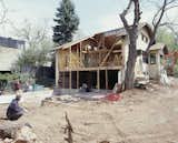 The residents moved to Boulder from Chicago and wanted a “big open loft combined with the feeling of a tree fort,” Moore says. But before his team could build, they had to do a significant teardown. “We scrapped the entire interior out of the house,” Moore says. “It was a disaster: asbestos all over, lead paint throughout. We left the front half of the roof and two side masonry walls but had to rip everything else out.”

Photo courtesy of Mike Moore/Tres Birds Workshop
