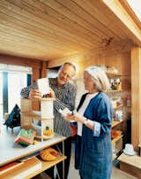 In the living room of their home at The Sea Ranch, Maynard Hale Lyndon and Lu Wendel Lyndon examine LyndonDesign’s new shelving system. Next to the system sits Maynard’s prized Cubicus by Peer Clahsen.