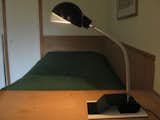 This light in an upstairs bedroom (A703) was originally developed in 1929. This is a later version sold through Artek.