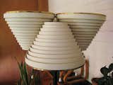 Standard Light A809, a floor lamp in the living area, features three ringed cones.