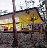 Walla Womba Guest House, Bruny Island, Tasmania, Australia, 2003

1+2 Architecture

Photo by Peter Hyatt, courtesy National Building Museum 

The Walla Womba Guest House utilizes a raised steel frame to sit lightly on its thickly wooded site, and lifts the house to help keep natural drainage patterns intact.  Photo 4 of 4 in Yale School of Architecture Exhibits