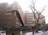 A dorm-row-side view of Baker House during the dark depths of Boston winter.