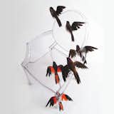 Reiko Kaneko's chair features a flock of birds in flight.