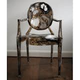 Kelly McCallum's burned chair, animated with a hummingbird.