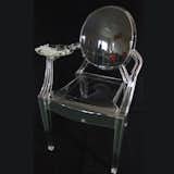 Thelermont Hupton adds a plate of British fare to the chair, camouflaging it by using the same material as the chair.