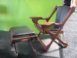 This Don Shoemaker rosewood lounger chair and ottoman have beautifully aged black leather stretched between the criss-crossing arms of the frame. -Sarah  Photo 6 of 15 in Best of SF 20 Modernism Show by Aaron Britt