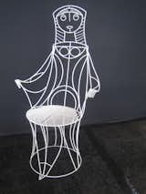 Here's a better view of just one of the chairs. The wire woman's hair reminds me of a nun's habit. -Aaron