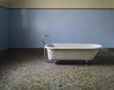 This lone bathtub against a sea of tile was used by patients at Fairfield State Hospital in Newtown, Connecticut.