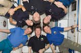 Expedition 20 crew members pose for an in-flight crew photo in the Harmony node of the ISS. Pictured clockwise are Russian cosmonaut Gennady Padalka (bottom center), commander; Russian cosmonaut Roman Romanenko, NASA astronaut Nicole Stott, Canadian Space Agency astronaut Robert Thirsk, European Space Agency astronaut Frank De Winne and NASA astronaut Michael Barratt, all flight engineers. Photo taken October 1, 2009. 

Courtesy of NASA  Photo 9 of 25 in Life in Space: Email from the ISS by Miyoko Ohtake from Space Living: Astro Home