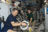 Canadian Space Agency astronaut Robert Thirsk and NASA astronaut Nicole Stott, both Expedition 21 flight engineers, work in the Harmony node of the International Space Station. Photo taken October 11, 2009. 

Courtesy of NASA