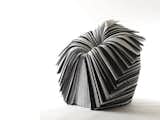 Nendo designed the Cabbage Chair for the XXIst Century Man exhibition curated by Issey Miyake in 2008. The piece is made of pleated paper created as a by-product during fabric production. The material would ordinarily be discarded.  Photo 6 of 6 in Nendo Takes Over MADProjects Gallery