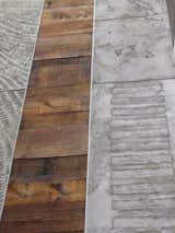 The original floorboards accompany the stamped list of property owners.