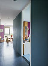 Yvette studies in her bedroom. The use of different colors for the various walls was inspired by the orange exterior.  Photo 12 of 22 in Modern Communal Living in the Netherlands