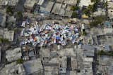 Haitians set up impromtu tent cities thorough the capital after an earthquake measuring 7 plus on the Richter scale rocked Port au Prince Haiti just before 5 pm yesterday, January 12, 2009. Image: UN Development Programme on Flickr  Photo 1 of 1 in An Architecture Prof Weighs in on Haiti