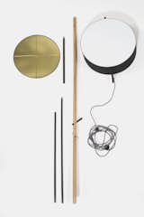 A series of rods, dowels and a drum shade make up the guts and the goodness of Rich Brilliant Willing's design.