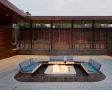 The Curved House in Springfield, Missouri, offers a cozy fire pit in an interior courtyard.