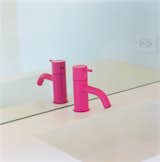 Magenta is one of Grunbaum’s favorite colors, so he picked out a magenta Tufty-Time couch by B&B Italia and added a hot pink powder-coated faucet by Vola for the downstairs bath.