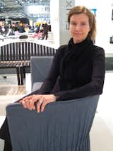 Designer Anna von Schewen, seated on her Dress sofa.