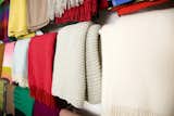 Rows of blankets line the wall, and the shop offers an international selection from 18 different countries.