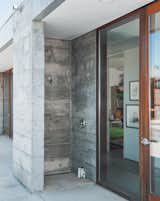 Outdoor and Shower Pools, Tubs, Shower An outdoor shower is made from one complete concrete module—a visual demonstration of how the entire house was built.  Photo 8 of 23 in Fertile Grounds