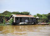 The houseboats and other transportable dwellings are constructed by each family, occasionally with a the help of a more experienced builder in the community. Many are built from bamboo, teak, thatched palm leaves, corrugated metal, and found materials -- plastic sheeting, discarded banners, tarps, fabrics, and the like.