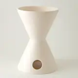 This mid-century-modern-style planter, which stands 26 inches high, rings of Case Study House qualities but speaks strongly to those captured by recently renewed cravings for all things ceramic. Available in matte glazed, gloss glazed, and natural bisque.