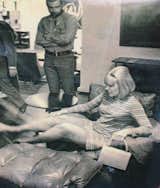 Kim Novak tries out the Moleca chair in the Oca Industries gallery, date unknown. Photo courtesy Espasso.