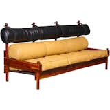 Rodrigues made a Tonico sofa in the 1960s, also of jacaranda and leather. 

Photo courtesy Noho Modern.