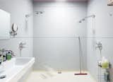 The huge master bathroom includes a fully accessible walk-in shower.  Photo 9 of 13 in Village People