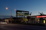 Lauren Woods's simple composition is rendered in Urdu. The text means "As long as the earth and the sky last/Smile like a flower in the garden of the world." Photo by Gerard Smulevich.  Photo 10 of 13 in How Many Billboards? in LA by Aaron Britt